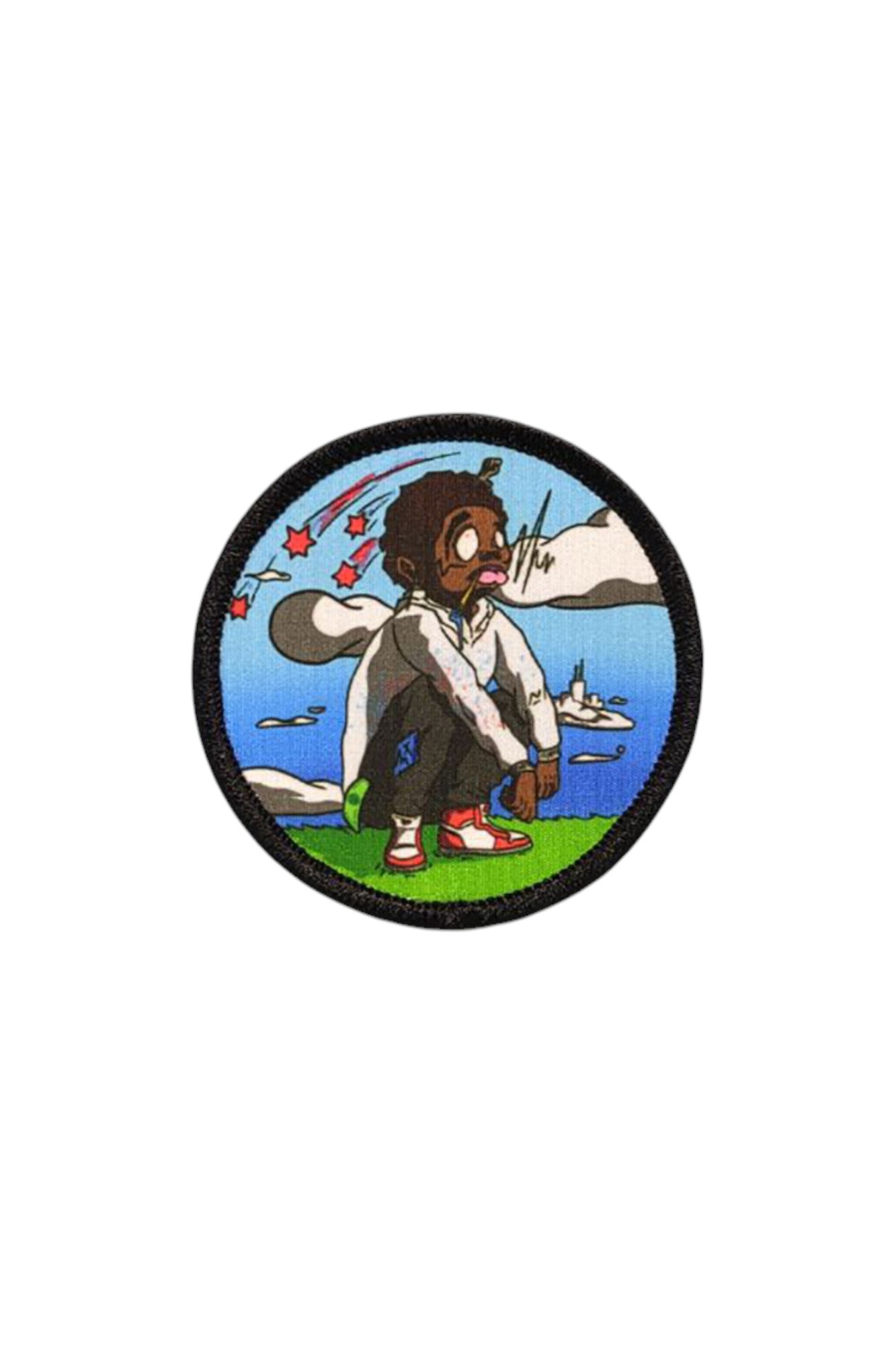 Circular sublimated Patch & Wear™ accessory featuring "Dreamers" by Anthony Bartley; vibrant illustration of a character with Chicago skyline and stars.