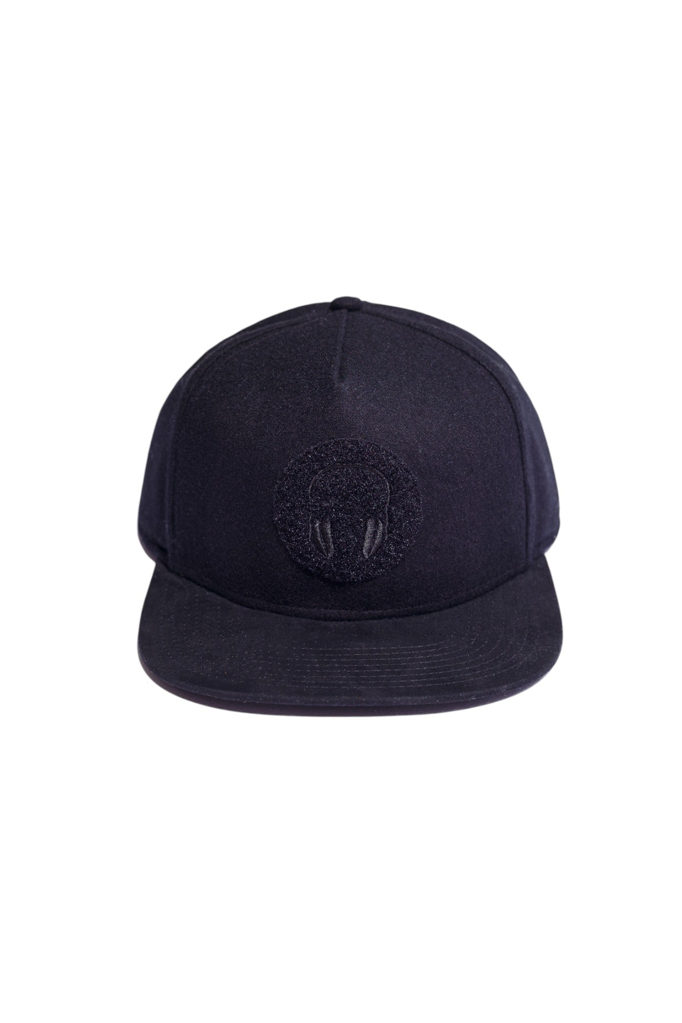 Black flannel and suede high-crown snapback with headphone embroidered receiving patch, front view.
