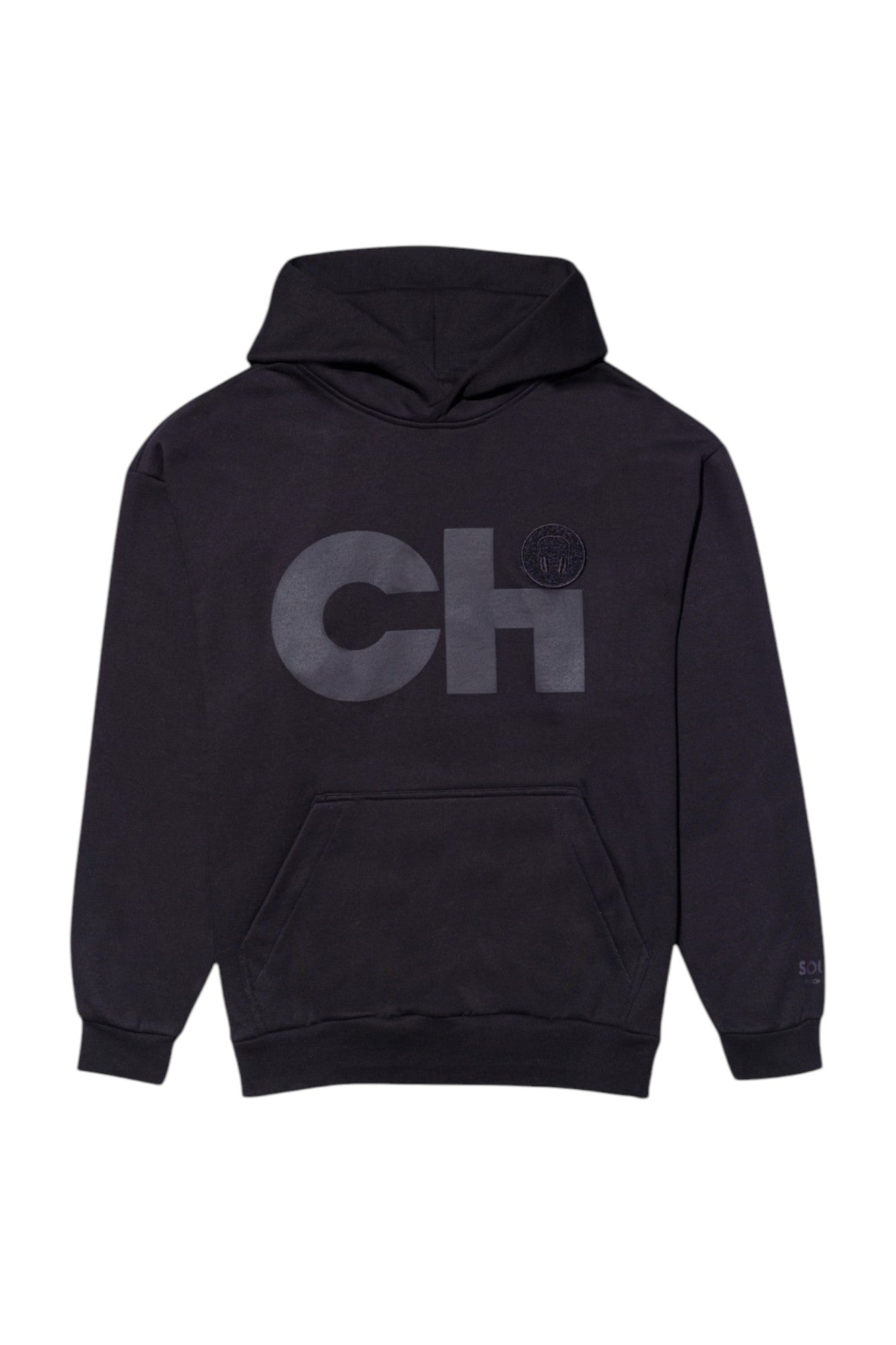Detail shot of the blackout hoodie showing the embroidered receiving area for interchangeable Patch & Wear™ accessories.