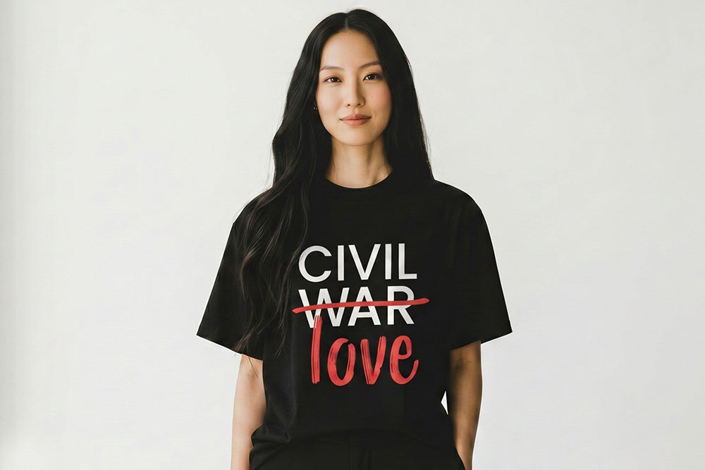 On-body traditional fit view of the black Civil War Flip The Script Graphic Tee, showcasing the premium 100% cotton drape, crew neck, and coverstitched sleeve details.