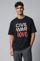 On-body traditional fit view of the black Civil War Flip The Script Graphic Tee, showcasing the premium 100% cotton drape, crew neck, and coverstitched sleeve details.
