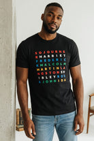 On-body traditional fit view of the black FreedomGram Juneteenth Graphic Tee, showcasing the premium 100% cotton drape, crew neck, and coverstitched sleeve details.