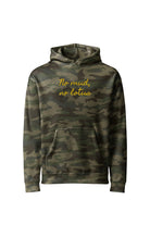 Front view of a rugged forest camo heavyweight hoodie featuring refined metallic gold embroidery on the chest reading "No mud, no lotus" in stacked cursive script.