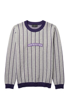 Light grey and purple Northwestern University heritage pinstripe classic crewneck knit sweater with arched purple varsity patch with NORTHWESTERN embroidered in white sewn onto the center front chest.