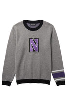 Light grey Northwestern University powerstripe classic crewneck knit sweater with purple and white stripe detail on left sleeve and purple and white Block "N" embroidered varsity patch sewn onto center chest.