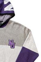 Close up detail of "NU" interlock embroidered crest patch sewn onto Northwestern University purple, white, and light grey striped hooded knit sweater. 