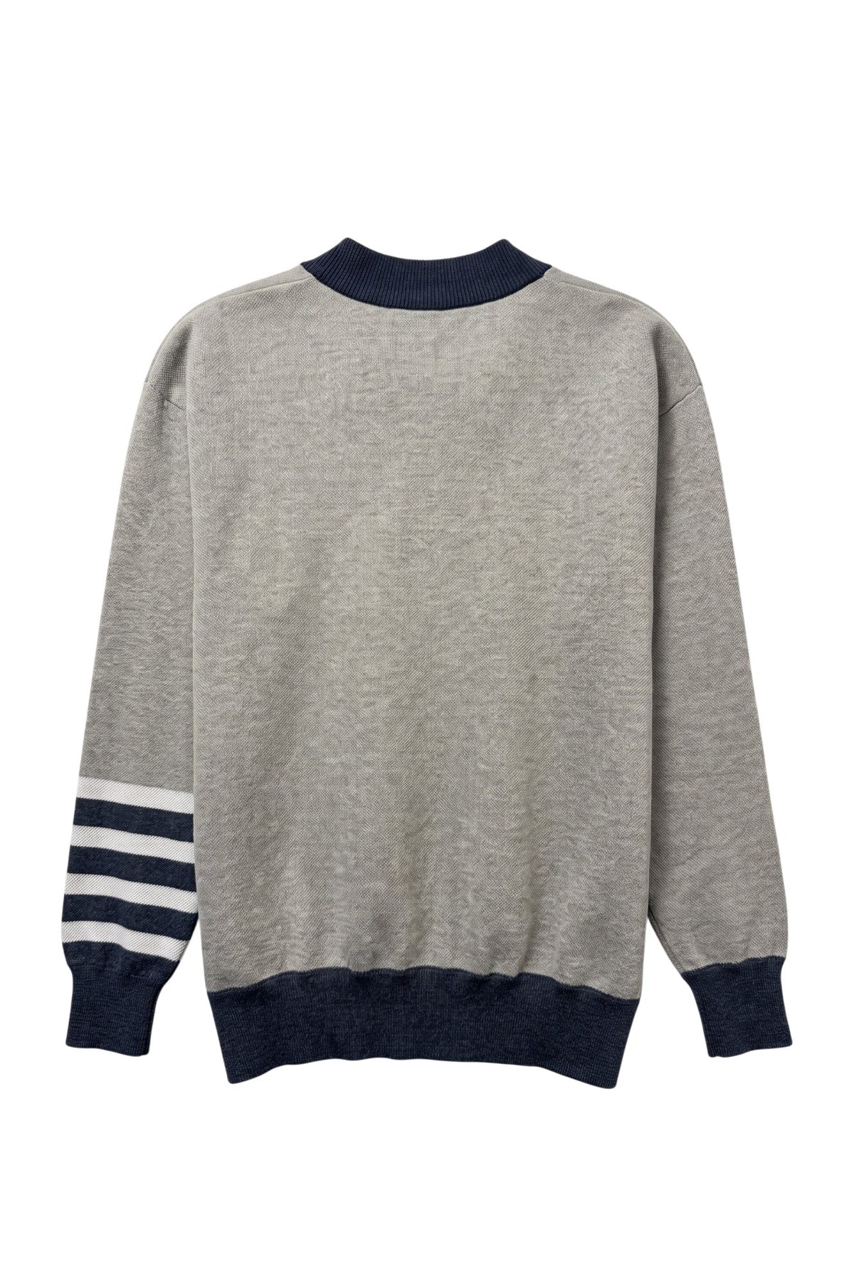Penn State University Letterman Band Cardigan Knit Sweater in grey with navy trim and navy and white forearm stripes, featuring Nittany Lion Shield knitted into the sweater BACK