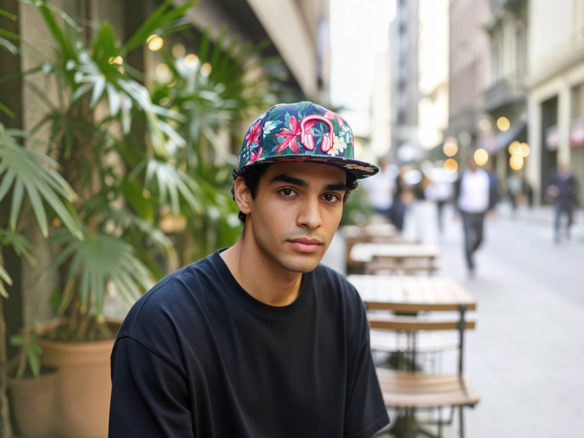 SOUNDOFF Flora Beats snapback hat in Twilight with a floral pattern and pink embroidered headphones.